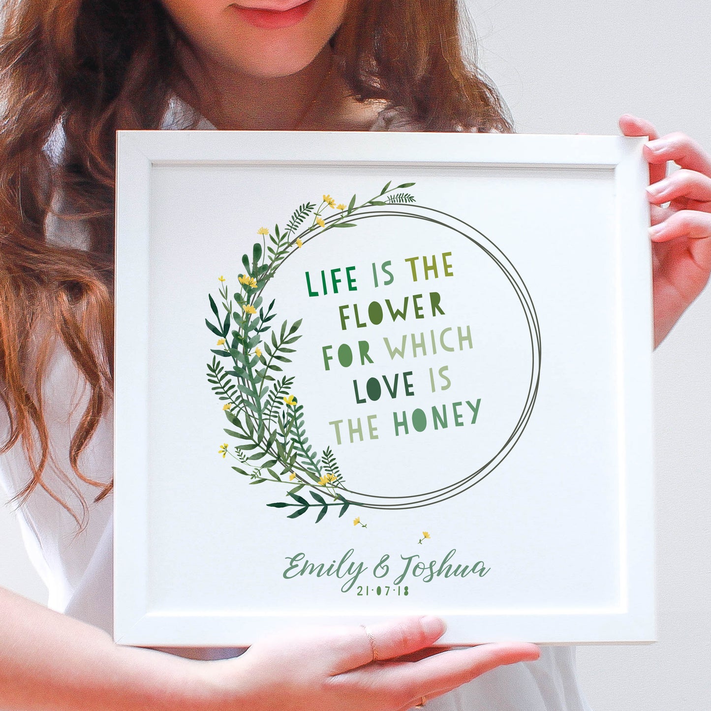 Anniversary Gift with a floral wreath framed in a white wooden frame