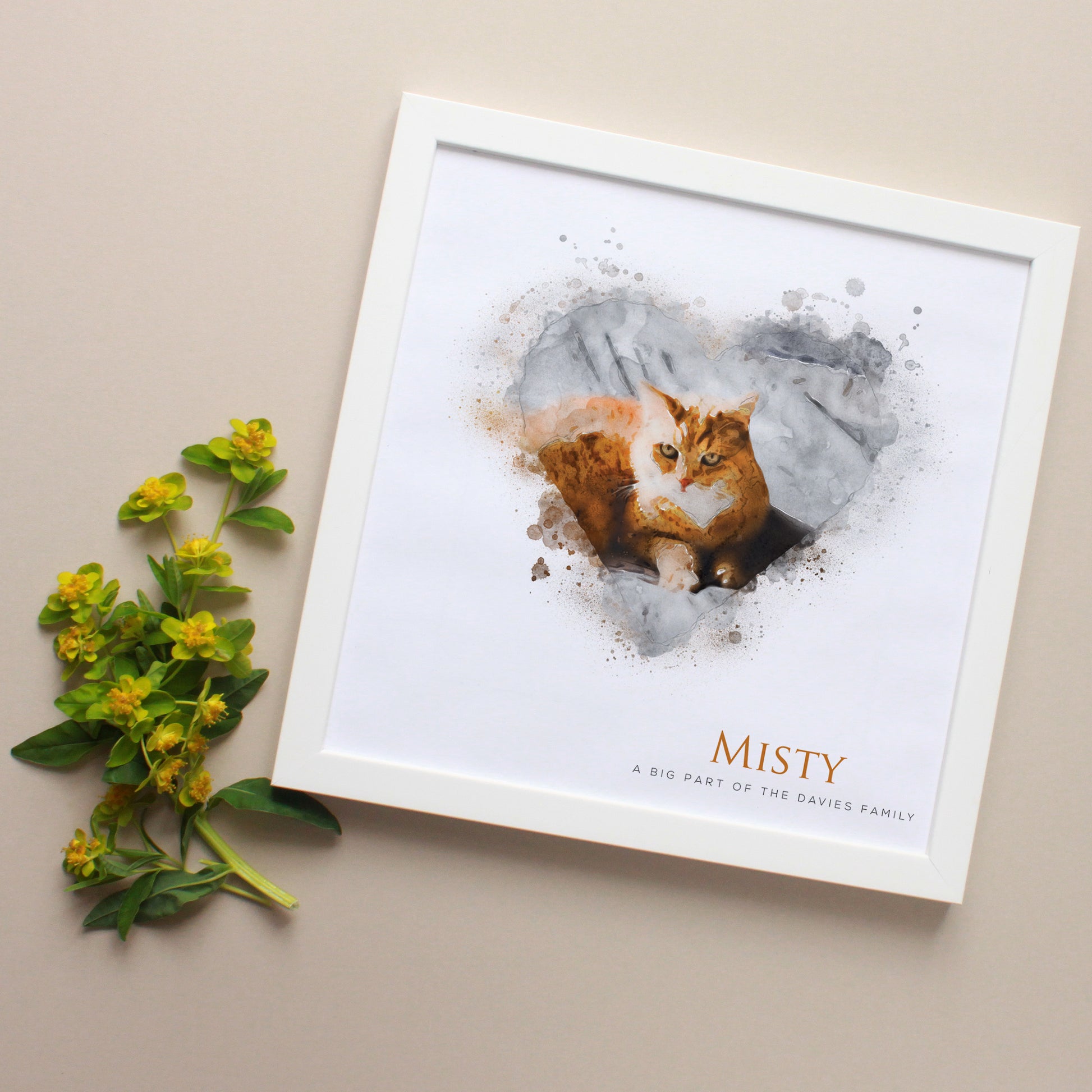 watercolour portrait of ginger cat in a heart, framed in white wooden frame.