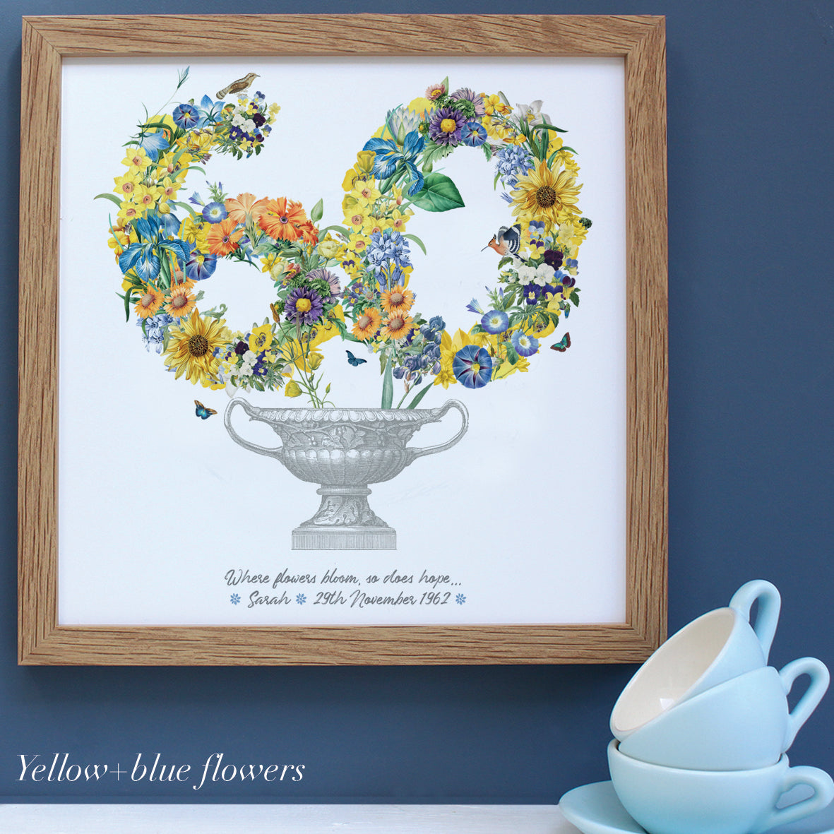 60th birthday flowers in yellow and blue in an oak frame