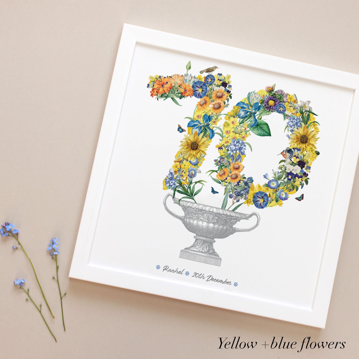 70th yellow and blue flowers in a vintage urn in a white frame