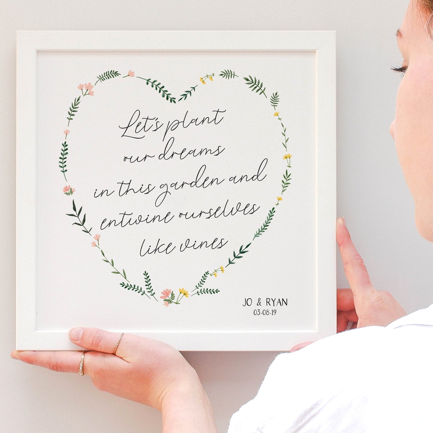 engagement floral heart with pink and yellow flowers in a white frame