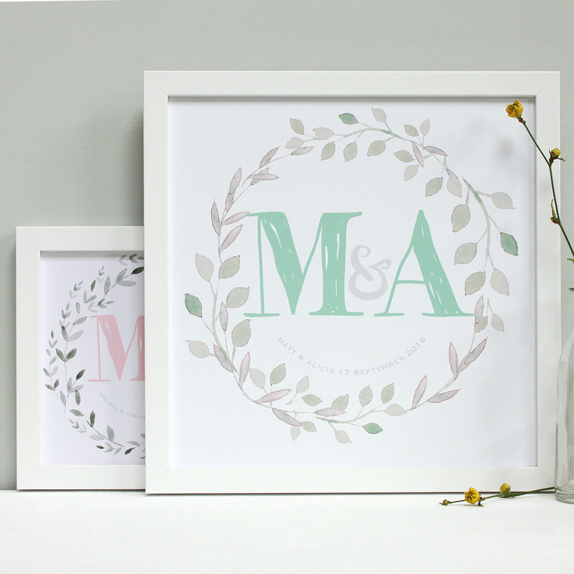 small and large white frames