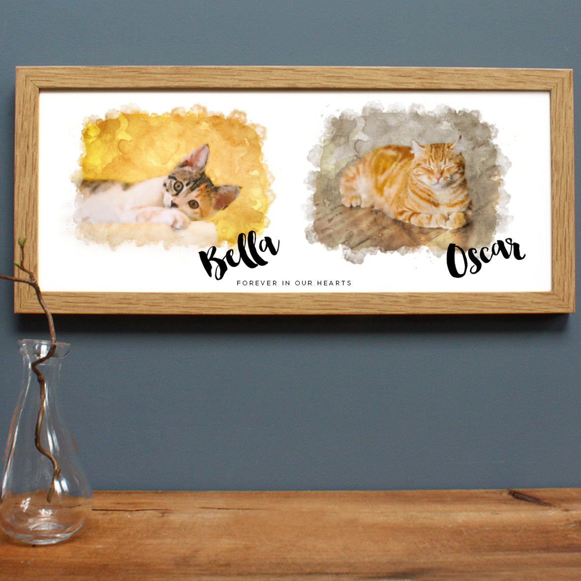 oak frame with two cat drawings, one ginger cat, one tabby and white cat