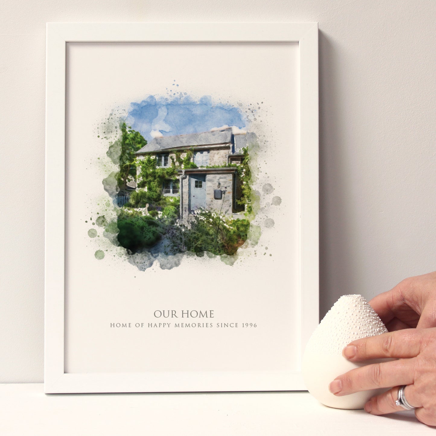 drawing of a Cornish traditional home with garden in a white portrait frame