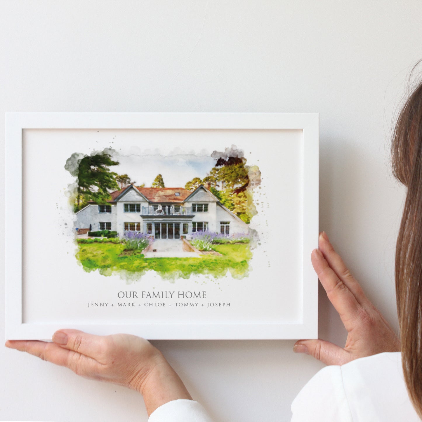 drawing of a contemporary family home in an A4 landscape wooden white frame
