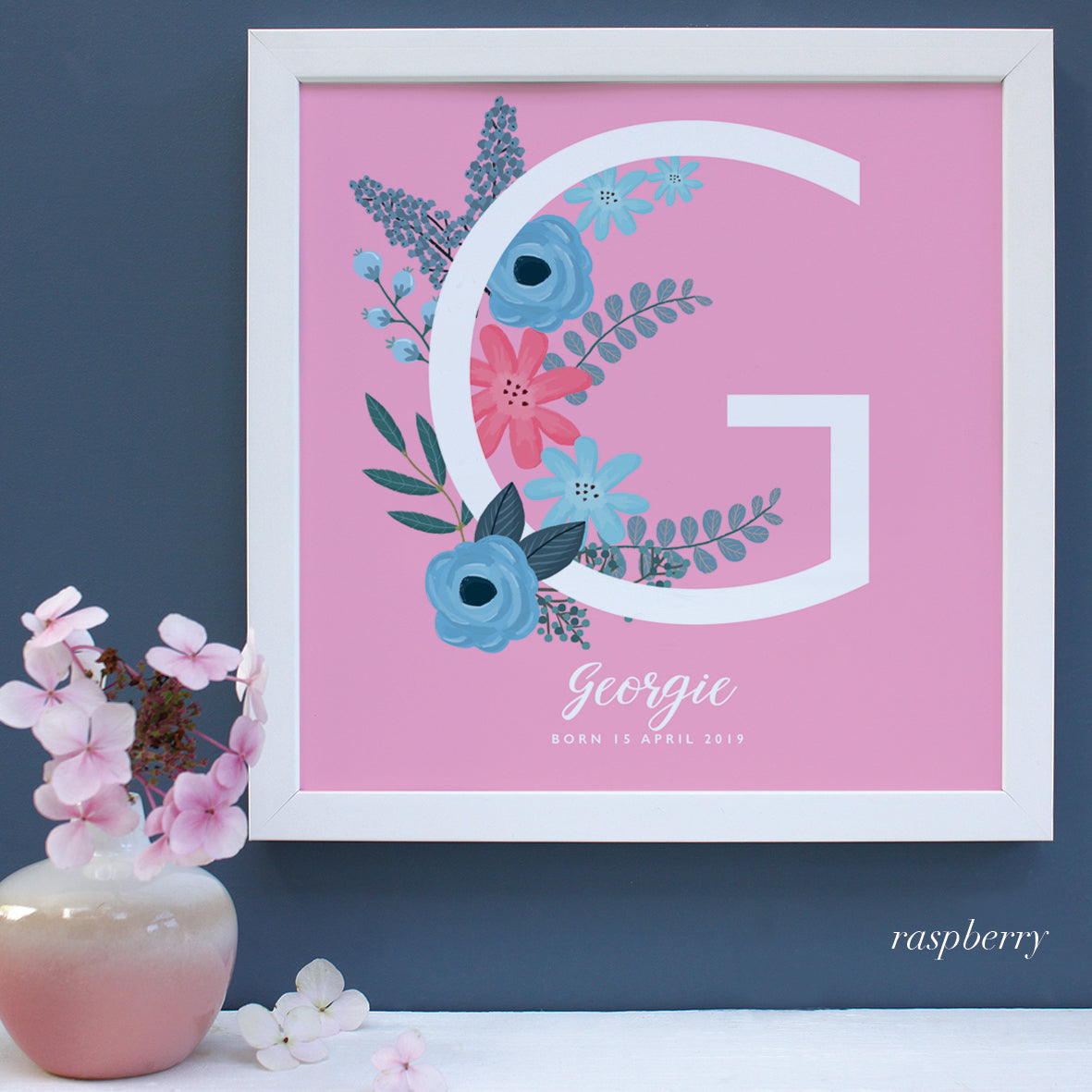 New Baby gift, white framed print with personalised names on pink background.