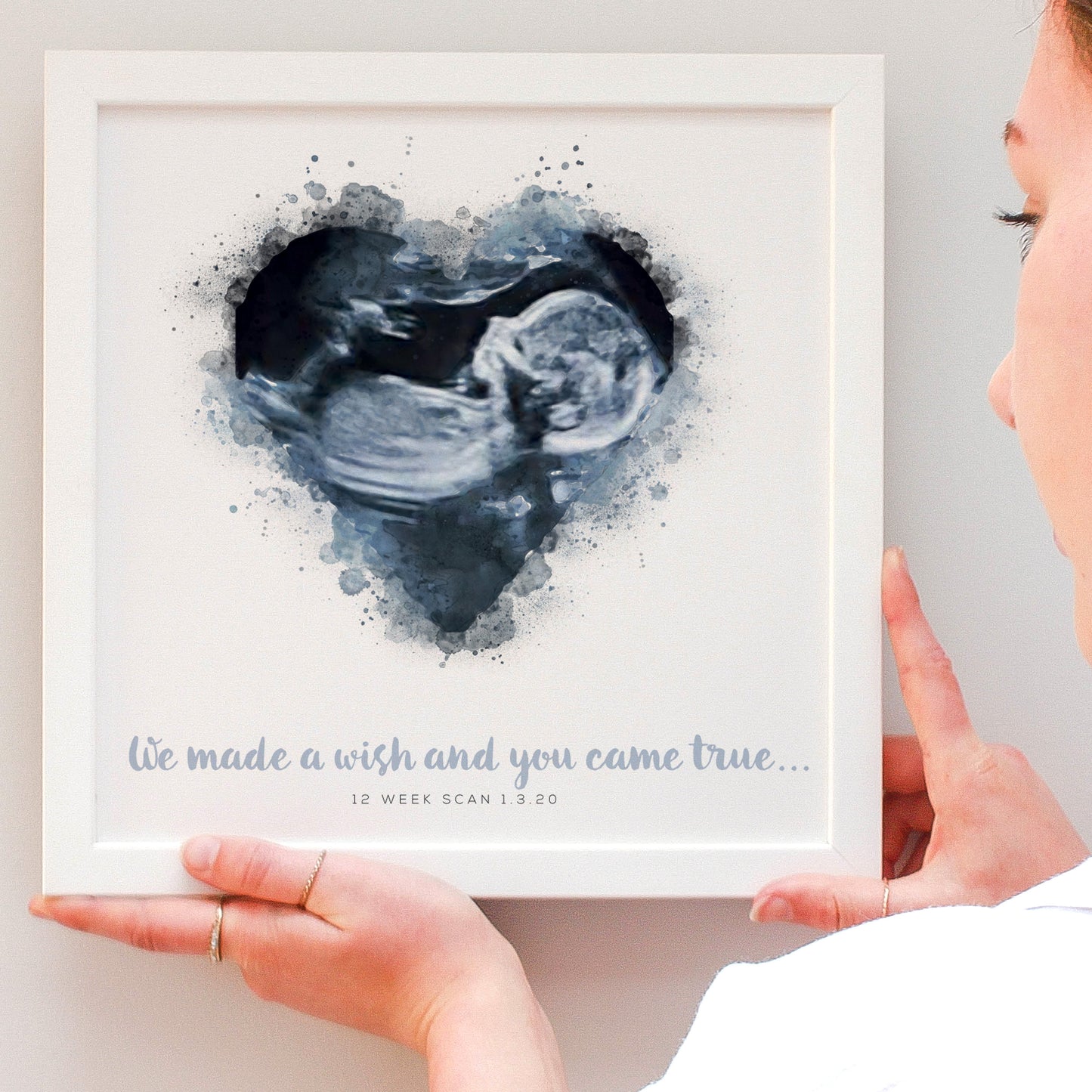 drawing of a baby scan in a heart in a personalised print blue