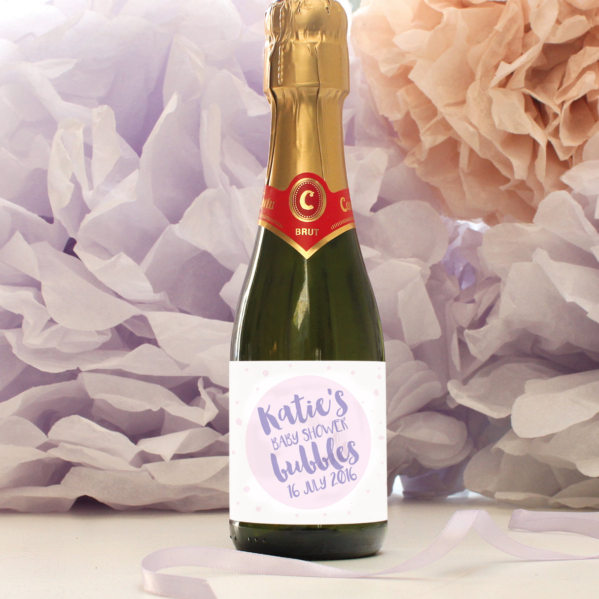 personalised heather lettering on baby pink champagne label, baby shower