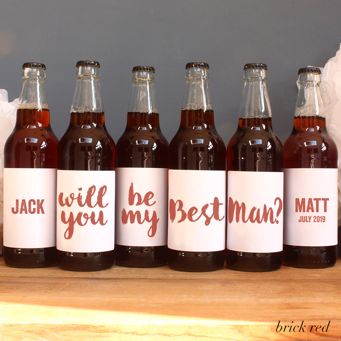 personalised brick red lettering on beer label, best man