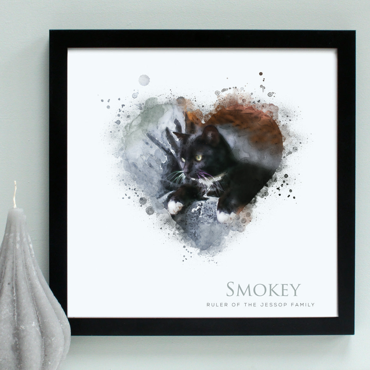 black fluffy cat, illustrated in watercolour and finished in a black wooden frame.