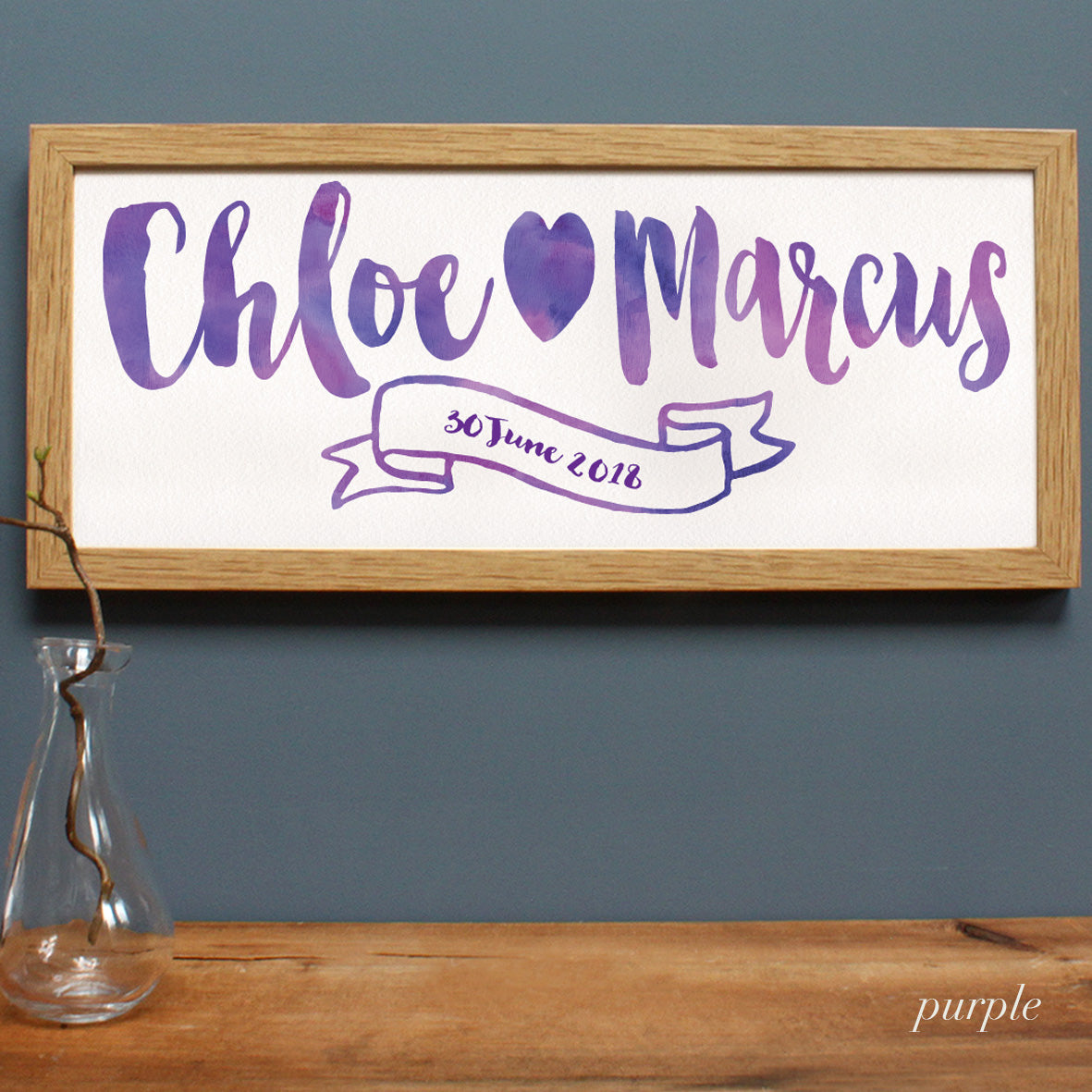 purple lettering with heart for a wedding gift in an oak frame